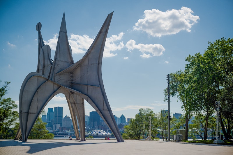 Stainless Steel Structure Under Blue Sky in Montreal.